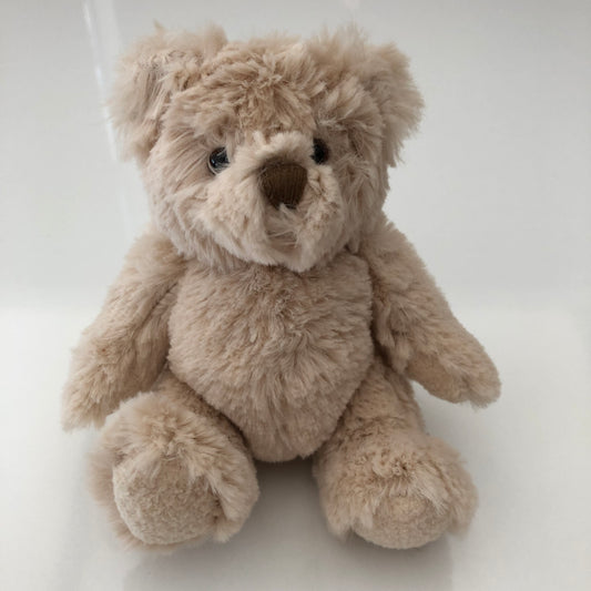 Light brown fluffy bear toy